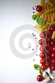 Cherry tomatoes, pasta, garlic and basil