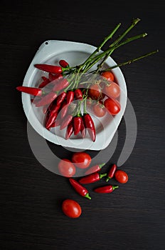 Cherry tomatoes and red hot chili peppers