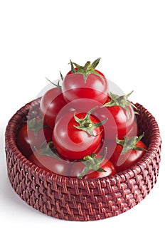 Cherry tomatoes in the small basket