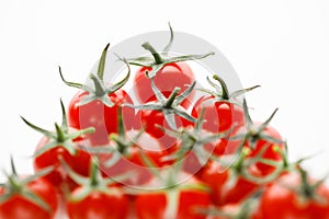 Cherry tomatoes on white background