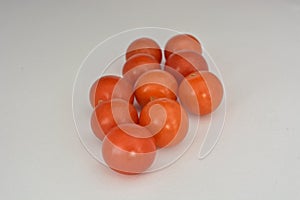 Cherry tomatoes on white background