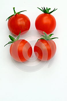 Cherry tomatoes on a white background