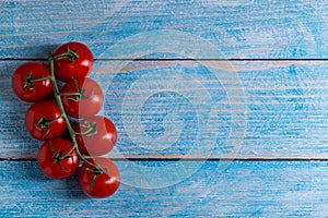 Cherry tomatoes on wooden table