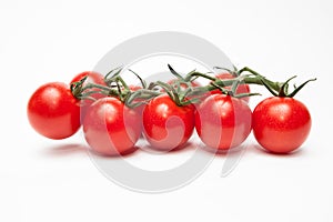 Cherry tomatos isolated on white