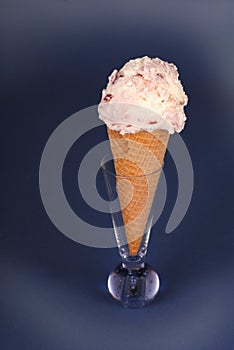 Cherry vanilla ice cream cone