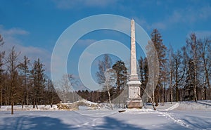 Chesma obelisk in Gatchina Park. Sunny winter`s day. photo