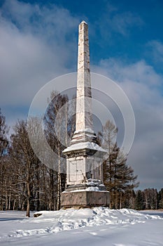 Chesma obelisk in Gatchina Park. Sunny winter`s day. photo