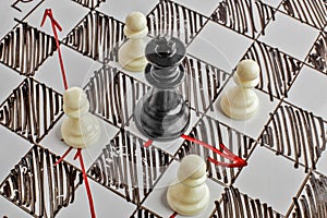 Chess. The black King is under attack. White board with chess figures on it.