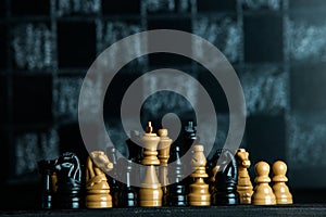 Chess board with chess pieces. Chess on the dark background. Business success concept. Strategy. Checkmate.