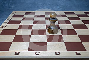 Chess board with figures. Wooden chess. Board games. Location of opponents. Counter strategy. Pawn