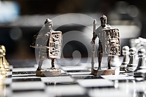 Chess board game concept of business ideas and competition and strategy ideas Chess figures on a dark background with smoke and