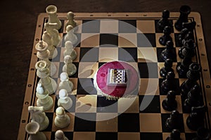 Chess board game concept of business ideas and competition and strategy ideas concep. Chess figures on a dark background with