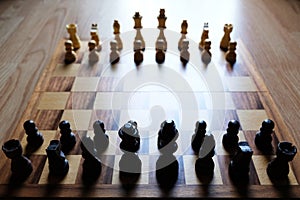 Chess board game. The fight begin. Business strategy and competition concept. Focus on black team