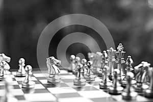 Chess board game. Fighting in black and white. Business competitive and strategy planning concept