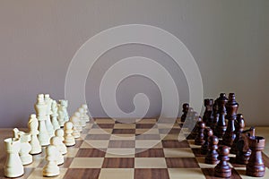 Chess board game. Two teams get ready for fight. Team concept