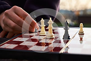 The chess board is made of wood.