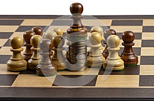 Chess board with pawns and coins, business growth or success and advantage concept