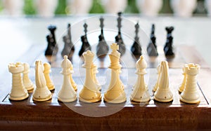 Chess board set up and ready to play. Narrow depth of field