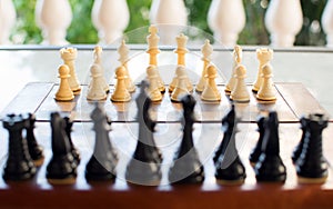 Chess board set up and ready to play. Narrow depth of field