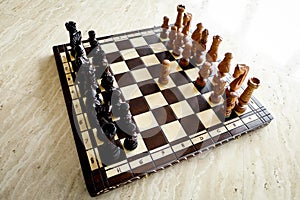 Chess board on travertin floor