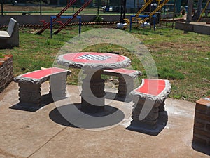 Chess, checker-board table in new public park South End, Big Cor