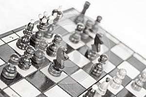 Chess. Chess board. Wooden chess pieces. black and white