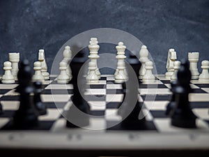 Chess. Chess pieces on the board. Board games. plastic figures. Strategic thinking