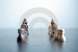 Chess figures on chessboard. concept of business strategy and tactic.