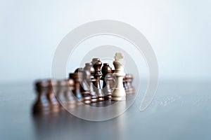 Chess figures on chessboard. concept of business strategy and tactic.