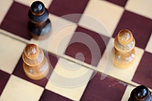 Chess figures on a chessboard. Top view