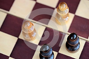 Chess figures on a chessboard. Top view