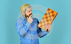 Chess figures. Intellectual games. Intelligent bearded hipster. Cognitive skills. Game strategy concept. Chess lesson