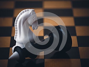 Chess game. Chess pieces on the game board. White and black. Tactical competition. Concept of a successful team work leader.