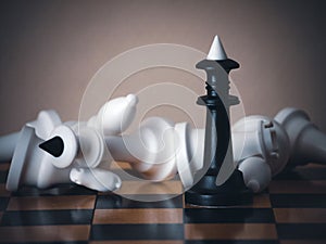 Chess game. Chess pieces on the game board. White and black. Tactical competition. Concept of a successful team work leader.