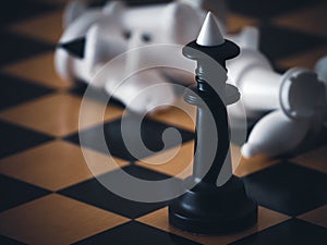 Chess game. Chess pieces on the game board. White and black. Tactical competition. Concept of a successful team work leader.