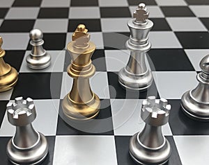 Chess game figures in the middle of the battle