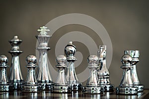 Chess game. A group of silver chess team. Business strategy and team work concept. Focus on pawns at front row