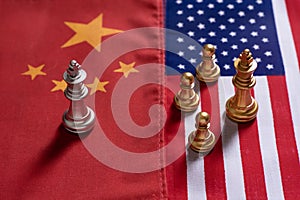 Chess game, A king stand confront the enemies on China and US national flags. Trade war concept. Conflict between two big