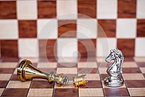 Chess game. A knight takes downs all enemies. Business competitive concept