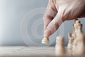 Chess game player makes a move the white pawn one step forward.