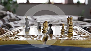 Chess game player making black rook move