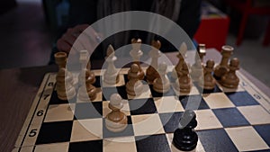 chess game between two opponents at the table