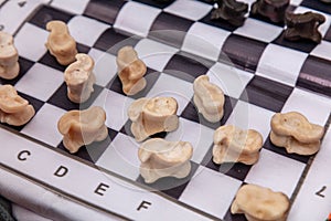 Chess game with white and black dice on a chessboard.