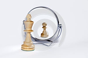 Chess king, chess pawn, contrast, reflection,