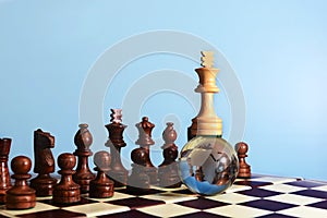 Chess king on globe