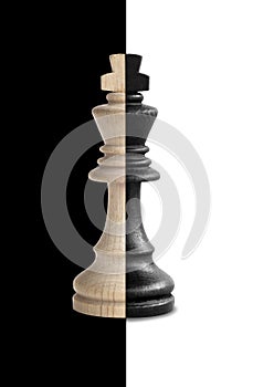 Chess king showing its duality in black and white background