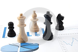 Chess man over business chart photo