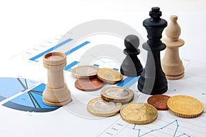 Chess man over business chart photo