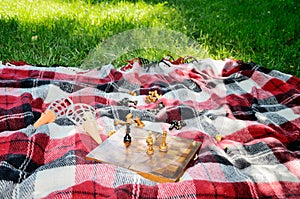 Chess on a mat in the park