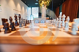 Chess Opening on a Wooden Chess Board Close-Up